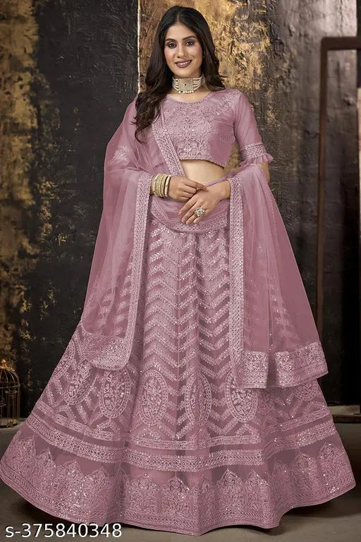 Pink embroidered net lehenga choli and dupatta set, featuring ethnic motifs, semi-stitched (44in waist, 42in length), from India