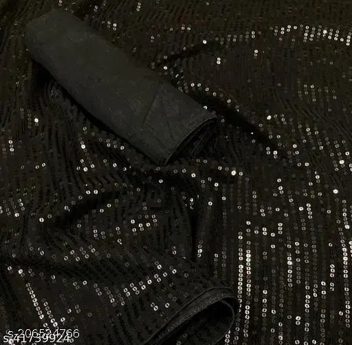 Black sequined saree with shiny fabric and silver details
