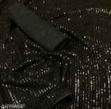 Black sequined saree with shiny fabric and silver details