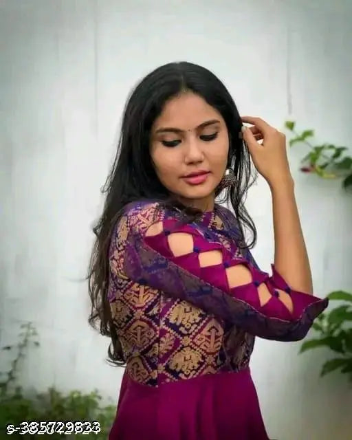 Woman in purple dress with lace sleeves