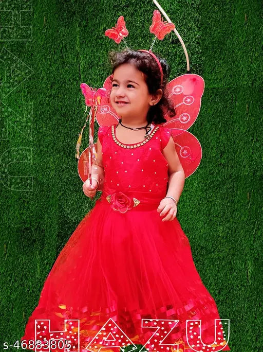 Red sequined dress with butterfly wings and heart decoration