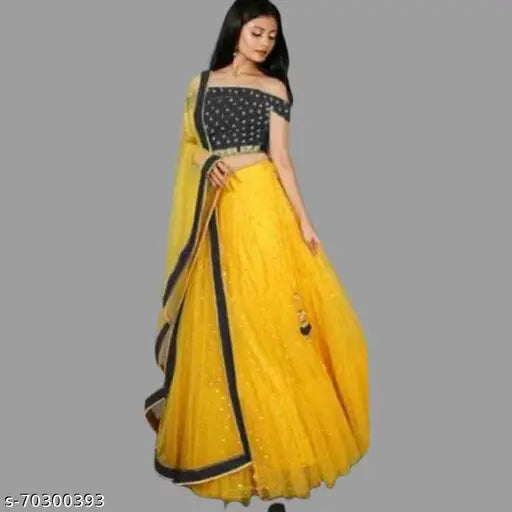 Yellow silk and net embroidered lehenga choli with heavy embellishments, paired with a lace dupatta. Indian semi-stitched bridal wear, waist size 42 inches, length 44 inches, dupatta length 2 meters