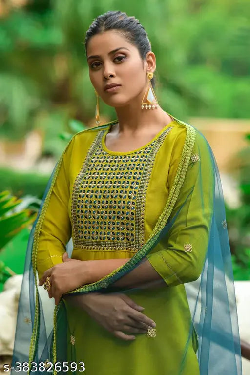 Yellow and green embroidered kameez set with matching pajamas