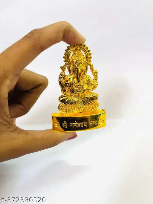 Gold metal Ganesh Idol, intricately hand-crafted, 5cm x 7cm x 1cm, India origin