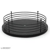 Black, metal, tiered utensil holder tray with 2 levels and 6 compartments, designed as a lazy susan for efficient kitchen organization