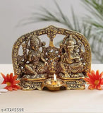 Decorative Hindu God idols of Laxmi and Ganesh with a lit diya, set against a floral background
