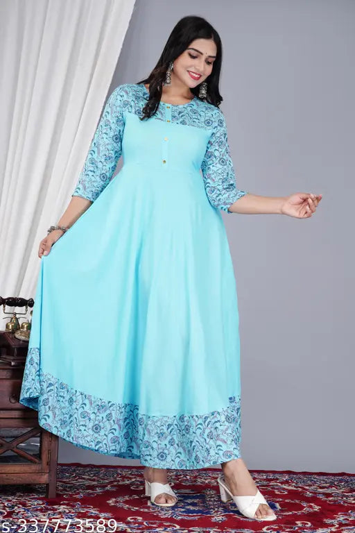 Teal flared rayon kurta for women, three-quarter sleeves, printed and solid design