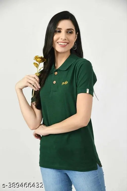Green cotton sustainable polo women's shirt with natural wood buttons and embroidered logo, eco-friendly and aesthetically simple for everyday wear