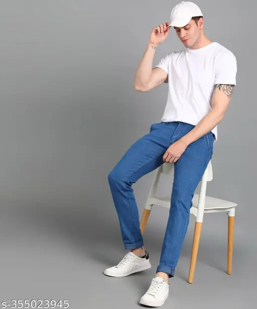 Light blue denim jeans, solid stretch fit for fashion-conscious men by Supernova Inc