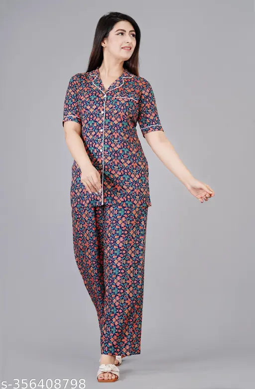 Women's printed rayon blue night suit set, art silk top and rayon bottom, short-sleeved, printed pattern on display