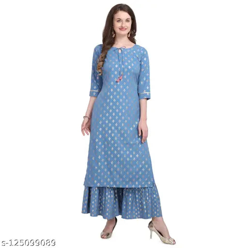 Printed polyester kurta set with palazzo bottoms, featuring mid-slit design. Indian-inspired women's fashion