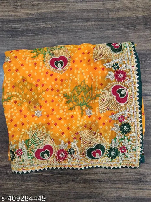Vibrant Bandhani pattern on a light yellow georgette fabric saree, traditional embroidery design