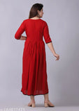 Maroon embroidered kurti. Cotton A-line dress with sleeves and flared hem.