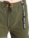 A dark green pant with a small black drawstring at the waistband and a white print on the right leg, showcasing its design