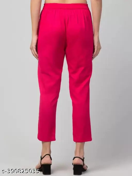 Women's Pink Cotton Blend Regular Fit Trousers, solid color, size S-XXL on display rack