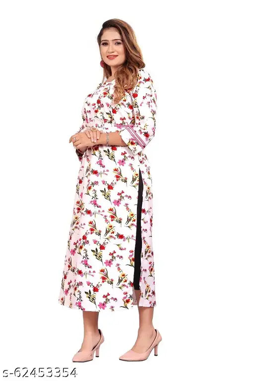Trendy long-sleeved white kameez with a floral pattern and black trim, likely cotton or synthetic fabric