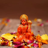 Orange Hanuman Ji hand-painted religious idol for success, home decoration & gifting. Quality polyresin material with intricate details, suitable for pooja room or living space. Ideal for anniversaries, weddings, or special occasions as a gift for friends, family, or parents. Made in India