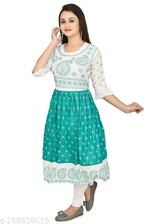 Rayon three-quarter sleeve girls' kurti sharara set in sea green and pink, ideal for festivals, daily wear, or special occasions. Premium quality cotton fabric, calf length with sleeves as shown. Anarkali gown from India