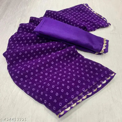 Purple and gold paisley patterned bandhani saree