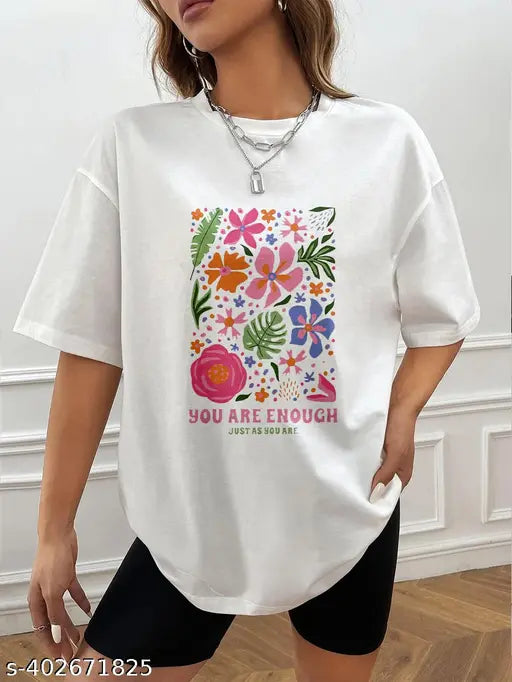 White half sleeve t-shirt with a flowery design and the phrase "You Are Enough" on it