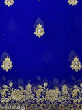 Embroidered party wear saree with a stone work detail and cutwork border, likely made of georgette fabric