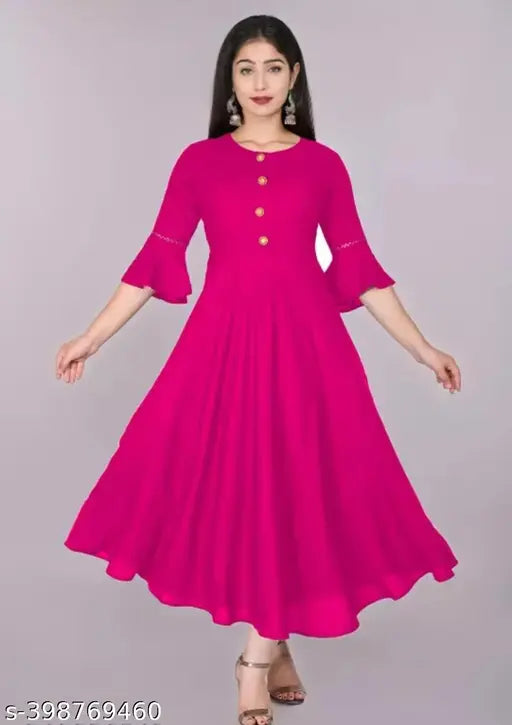 Pink round neck kurta with pleats and flared skirt