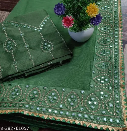 Green, embroidered, saree with intricate designs and borders
