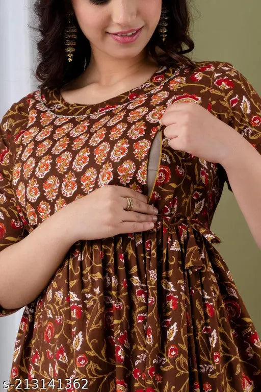 Pure cotton printed maternity gown, three-quarter sleeves, breastfeeding nighty dress by Anshul Textiles. Breathable and stretchy fabric for comfort during pregnancy events." (120 characters)