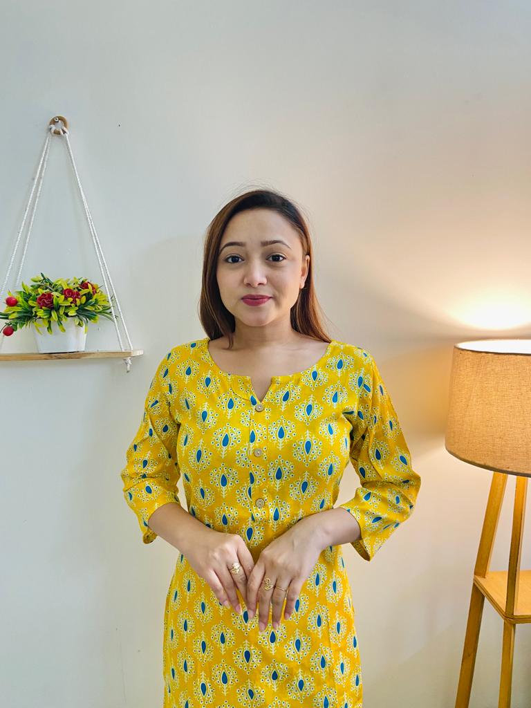 Hand-embroidered yellow kurti with matching pant set, traditional Indian ethnic wear