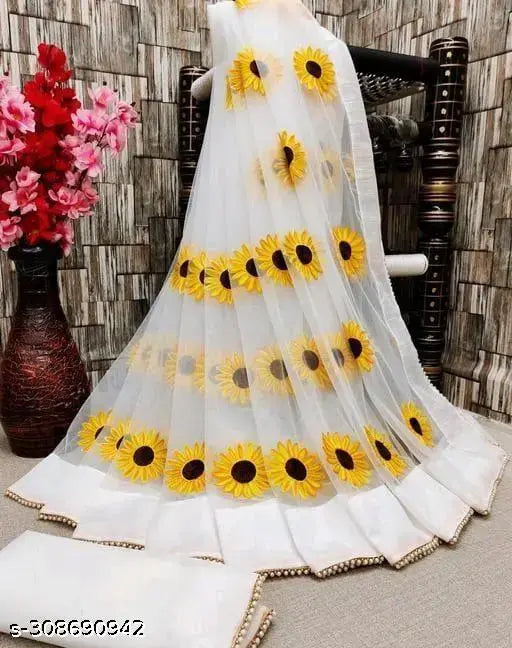 White net saree with embroidered moti work and unstitched blouse, ideal for Bollywood party wear