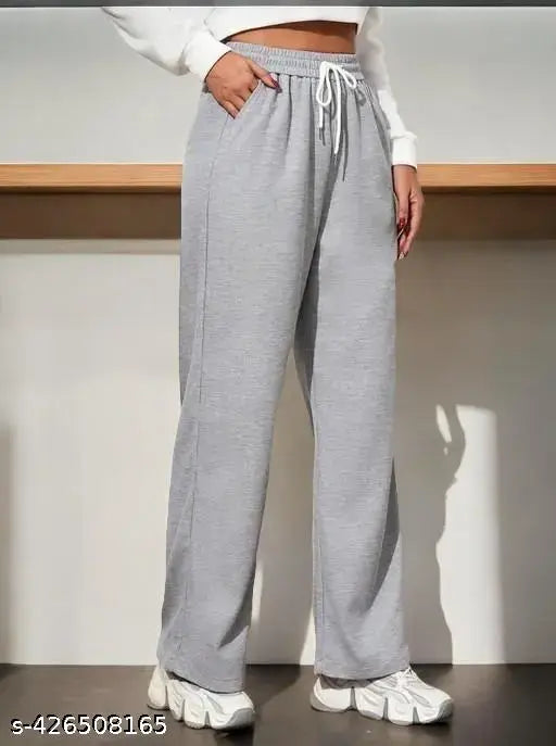 Gray joggers with white drawstring laces