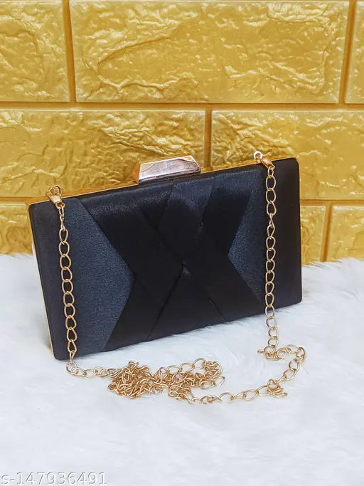 Black clutch with metallic chain strap