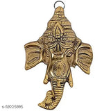 Gold-plated Ganesh wall art, intricately crafted Indian metal decor for a tranquil home