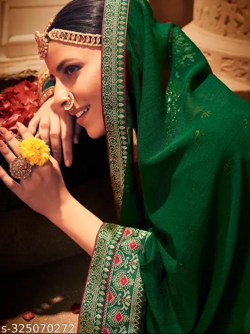 Rekha Maniyar saree with a green georgette border and unstitched blouse
