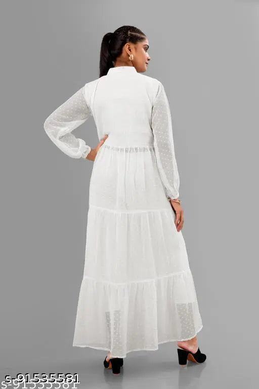 White Georgette puff-sleeve, round neck kurti with center slit and frills. Luxury festive wear for weddings and special occasions