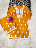 SLUB Rayon solid Chikankari fancy suit in cotton straight kurta with printed net skirt, three-quarter sleeves. Indian handcrafted fashion on display