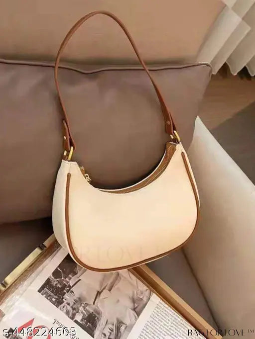 Tan leather sling bag, shoulder strap, spacious compartments