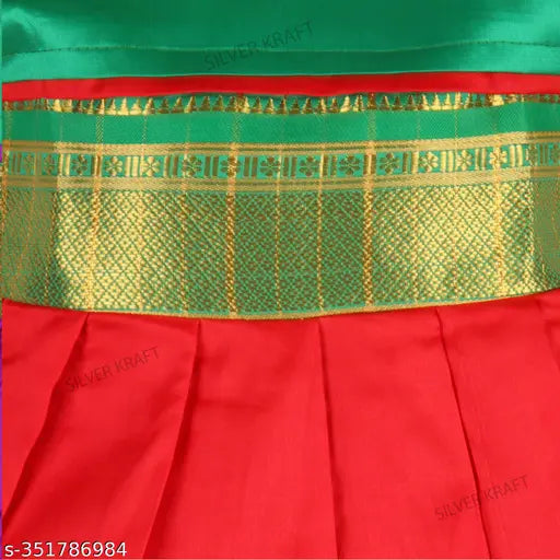 The image shows a cherry red and green frock with silver kraft embroidery on the bottom half. It appears to be knee-length, as indicated by the title. The dress is made of chanderi silk material, which is commonly used for traditional Indian attire, and it features an embellished border at the hem