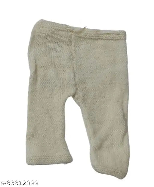 Off-white woolen baby sweater, cap, and booties for newborns (0-6 months), handmade in India with printed net pattern