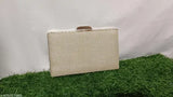 Pearl clutch with shiny surface and metallic finish