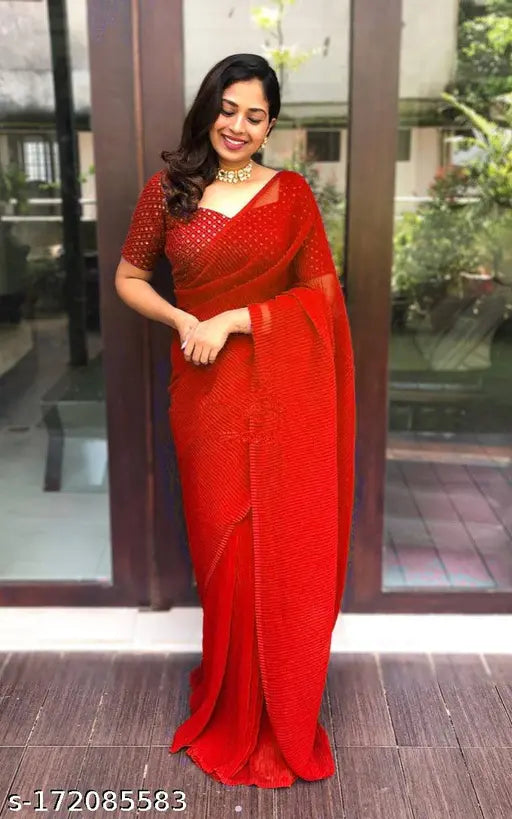 Red silk saree with a matching blouse