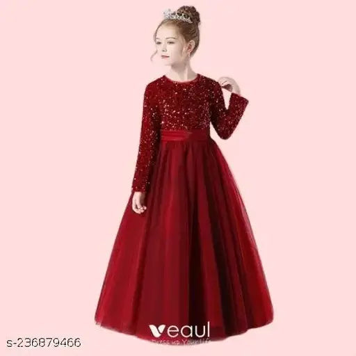 Red net gown with sequin work, long sleeves and gathered fitting, perfect for children's parties (India)