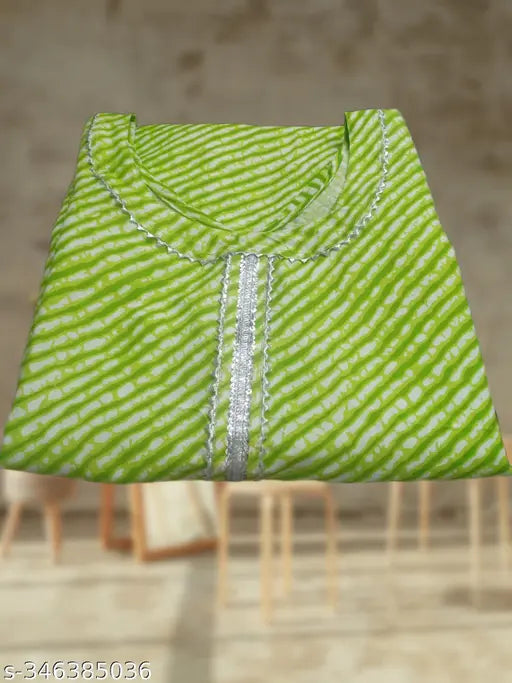 Plus size cotton kurti with heavy lacework, long sleeves, styled for a fashionable celebration