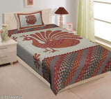 100 Cotton Jaipuri Printed Single Bedsheet - Grey with Peacock print, bedside table, and lamp.
