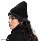 A woman in a black knit beanie and winter scarf