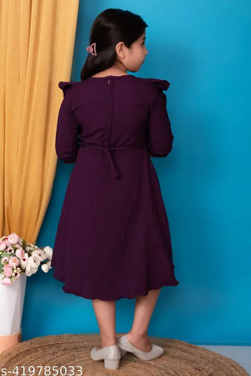 Purple dress, knee length, with puff sleeves