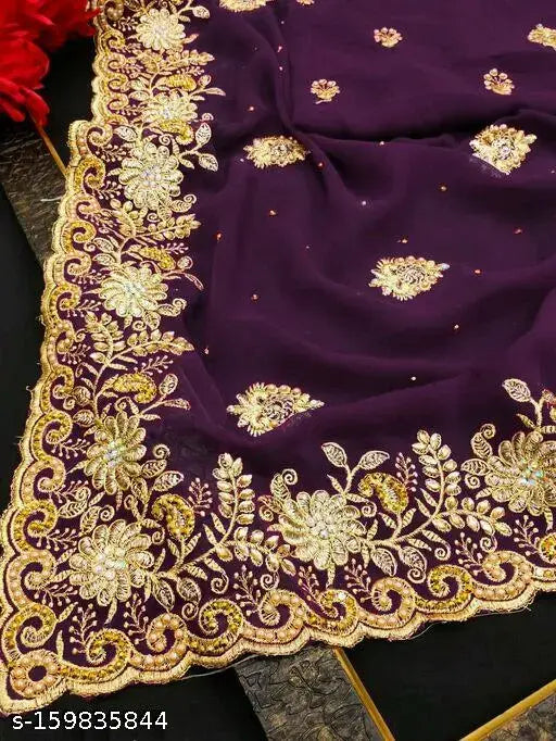 Purple georgette sari with intricate mirror and stone work, traditional border