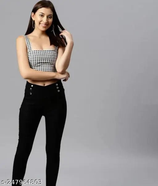 Black and white checkered crop top, blue denim high-waisted jeans