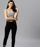 Black and white checkered crop top, blue denim high-waisted jeans