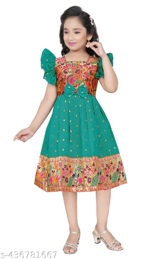 Kid's cross-back dress in green with paisley print